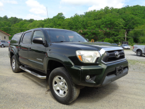 2013 Toyota Tacoma, Green, Grey interior, 217,409 miles, Crew cab, V6, 4WD, 5 speed Automatic, AM/FM radio, camper topper—$14,500 (photo 3 of 8)